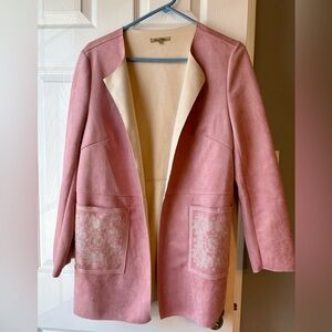 pink faux suede open-front duster jacket with embroidered pockets.
